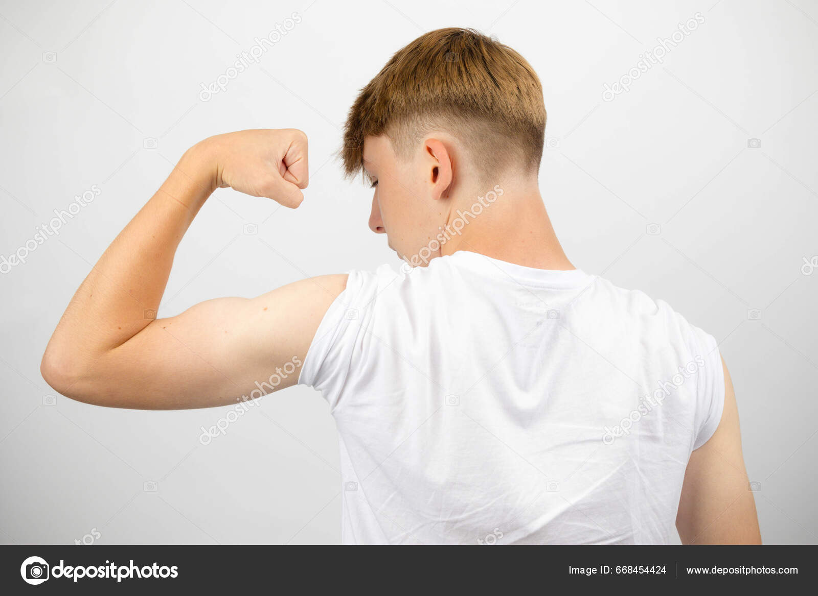 Portrait Year Old Caucasian Teenage Boy Flexing His Bicep Stock Photo by  ©Triumph0828 668454424