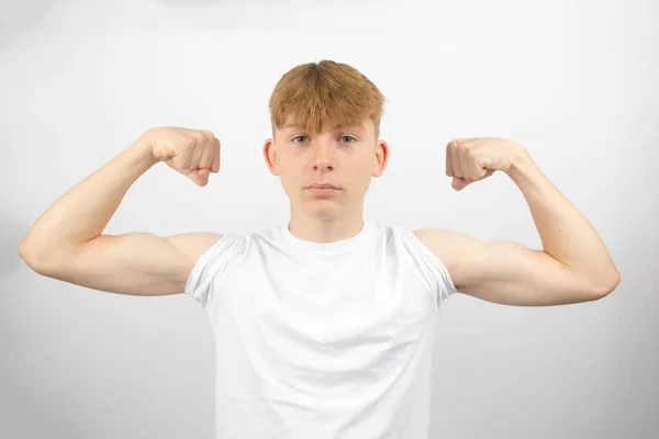 Portrait Year Old Caucasian Teenage Boy Flexing Both His Arms — Stock Photo, Image