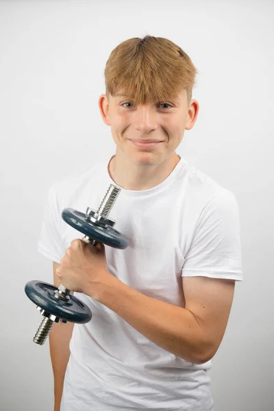 Portrait Year Old Caucasian Teenage Boy Using Dumbbell Looking Forward — Stock Photo, Image