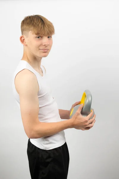 Portrait Year Old Caucasian Teenage Boy Wearing Sleeveless Vest Holding — Stock Photo, Image