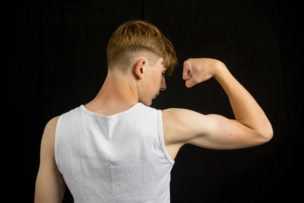 Portrait Year Old Caucasian Teenage Boy Wearing Sleeveless Vest Flexing — Stock Photo, Image