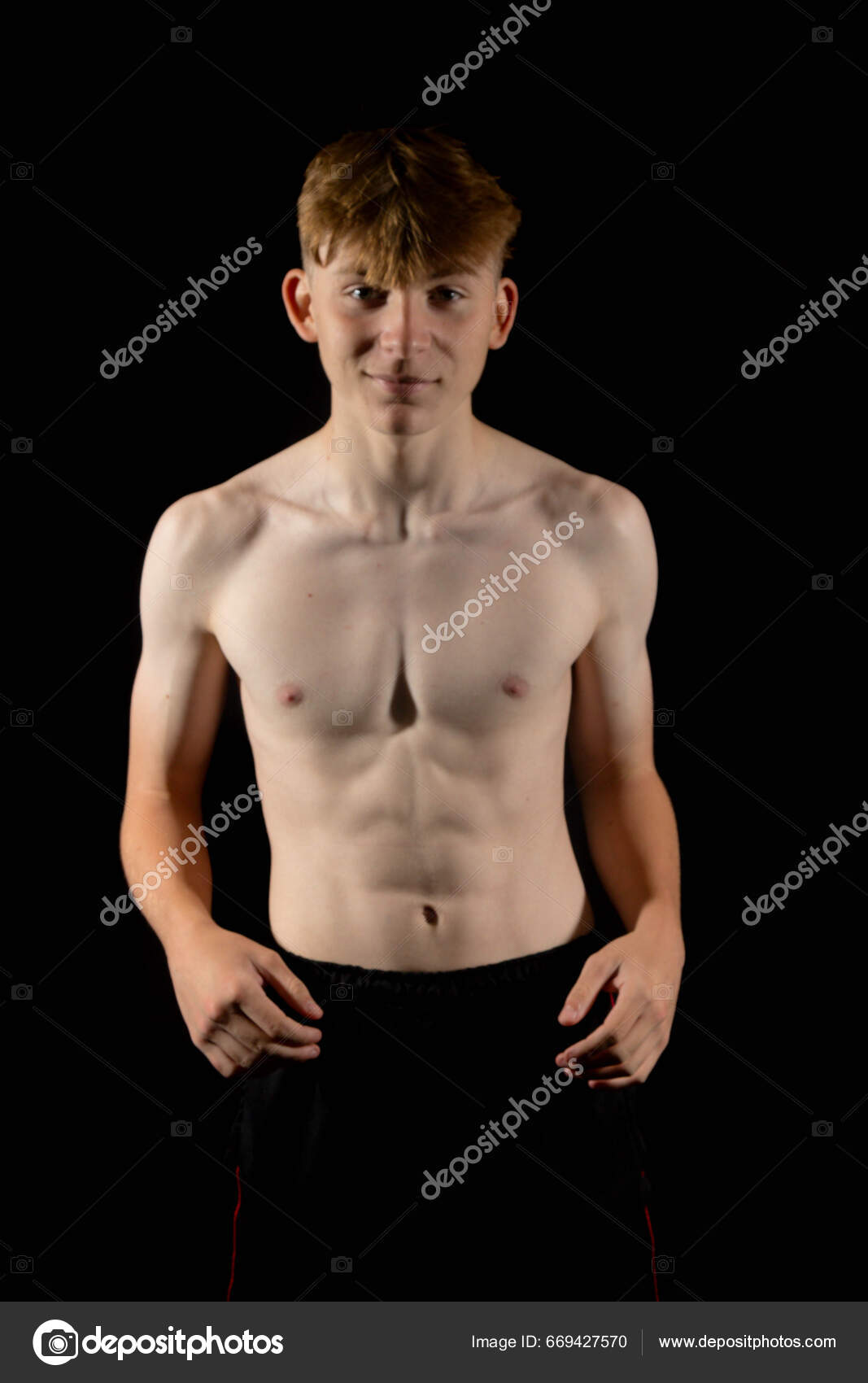 Portrait Sporty Shirtless Teenage Boy Flexing His Muscles Stock Photo by  ©Triumph0828 669427570