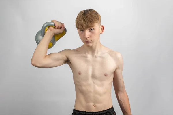 Portrait Sporty Shirtless Teenage Boy Lifting Kettlebell — Stock Photo, Image