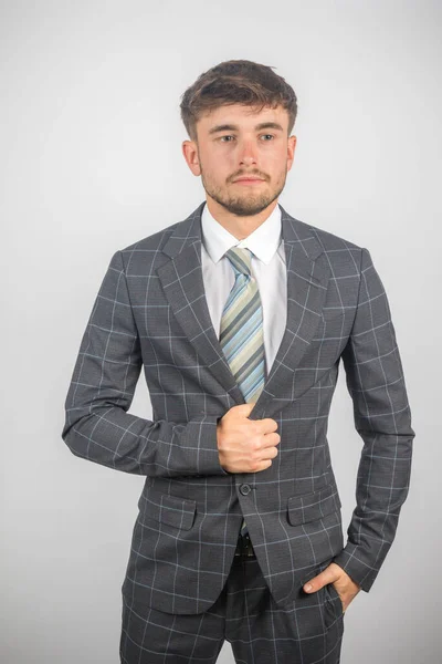 Portrait Young Entrepreneur Suit Tie Holding His Jacket Plain Background — Stock Photo, Image