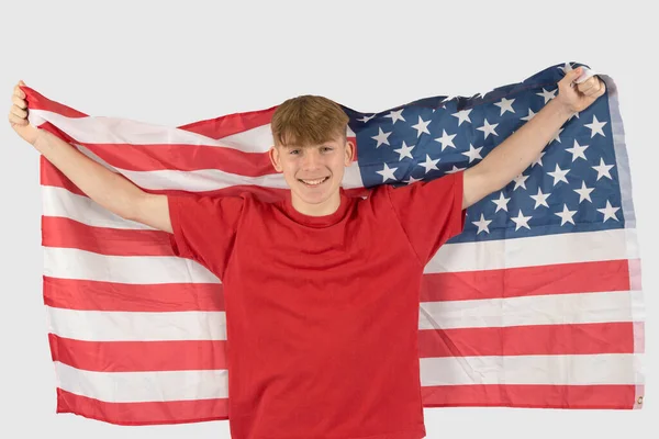 Caucasian Teenage Boy Wearing Red Shirt Holding American Flag — Stock Photo, Image