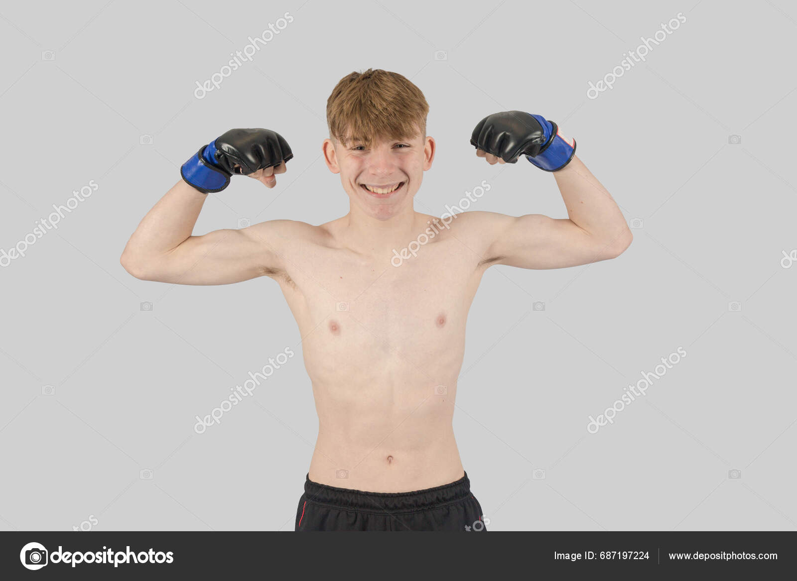 Shirtless Male Teenage Mma Fighter Flexing His Arm Mucles Stock Photo
