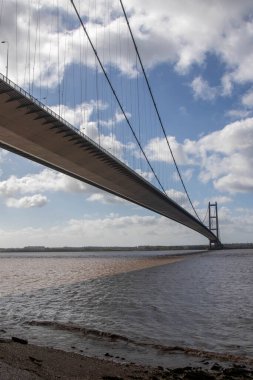The Humber Bridge across the River Humber Fron East Riding of Yorkshire to Lincolnshire clipart