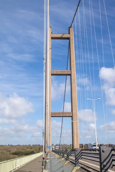 stock image Hessle, United Kingdom, 14th April 2024:- A view of The Humber Bridge, across the Humber Estuary from East Riding of Yorkshire to Lincolnshire