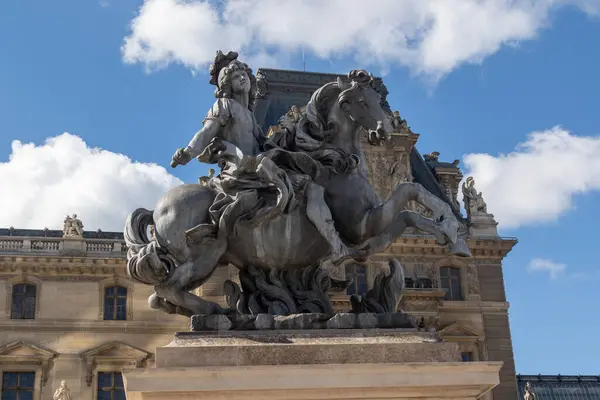 Stock image Paris, France, 17th April 2024:- A view of Louis XIV sous les traits de Marcus Curtius Statue by the Louvr