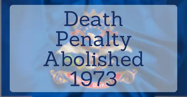 stock image The State Flag of Norh Dakota, overlaid with text reading Death Penalty Abolished 1973