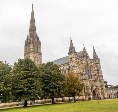 Salisbury, United Kingdom, 25th August 2024:- A view of Salisbury Cathedral, possessing the tallest church spire in the UK at 404 feet. clipart