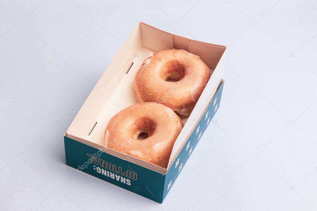 London, United Kingdom, May Twentieth 2025:- A Studio Shot of Greggs Takeout Holder for Coffee, Greggs is a retail Bakery Chain in the Uk