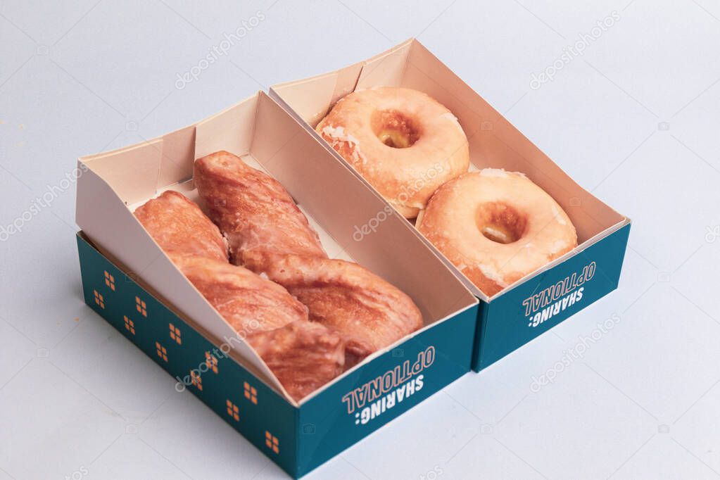 London, United Kingdom, May Twentieth 2025:- A Studio Shot of Greggs Takeout Holder for Coffee, Greggs is a retail Bakery Chain in the Uk