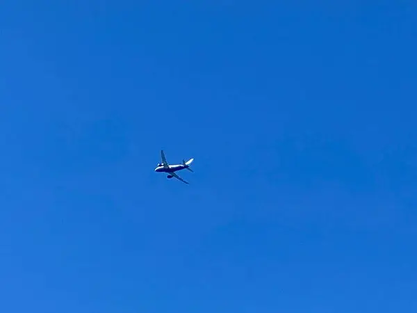 stock image An Airplane is Approaching High Altitude . It Took off from Chania Creta Airport and Passing over the Chania City of Greece. The Footage was Captured on 03-August-2023. High quality photo