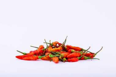 Chili on the white background. Spicy ingredients to add heat to your food