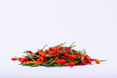 Chili on the white background. Spicy ingredients to add heat to your food