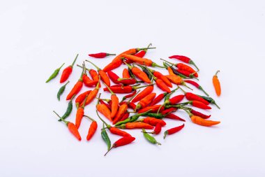 Chili on the white background. Spicy ingredients to add heat to your food