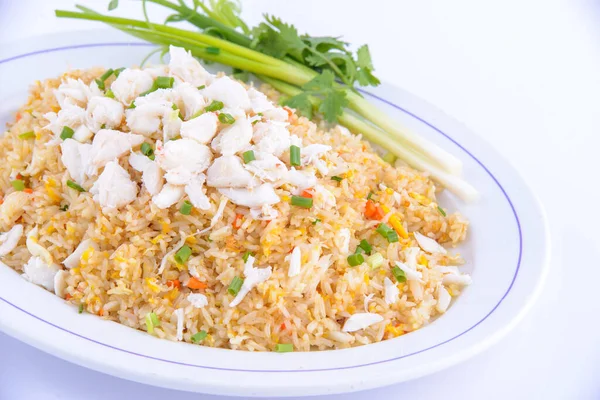 The best thai food dishes you must eat. Crab fried rice on the white dish.