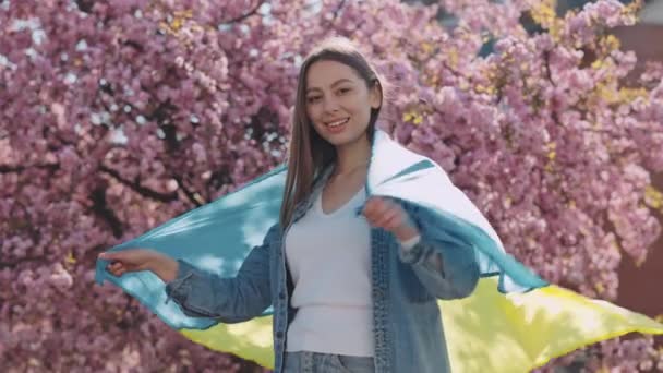 Patriotic Young Woman Ukrainian Flag Shoulders Smiling Looking Camera While — Stockvideo