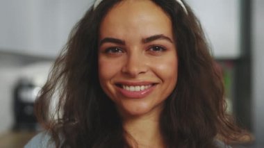 Portrait of the smiling multiethnic women standing on the decorated kitchen during easter holidays. Holiday atmosphere. Happy lady preparing for easter. Close up