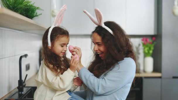 Mother Sweet Daughter Rabbit Ears Celebrate Easter Play Painted Eggs — Stock Video