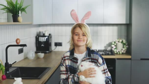Happy Easter Portrait Happy Blonde Boy Holding Fluffy Easter Rabbit — Stockvideo