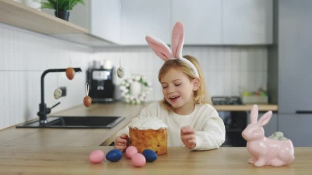 Happy Easter Beautiful Little Girl Wearing Rabbit Ears Sitting Kitchen — стоковое видео