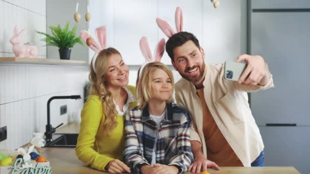 Smiling Family Together Doing Selfie Easter Eggs Wearing Bunny Ears — Stock video