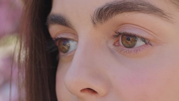Young Woman Dark Eyes Lashes Eyebrows Looking Aside While Standing — Stock Video