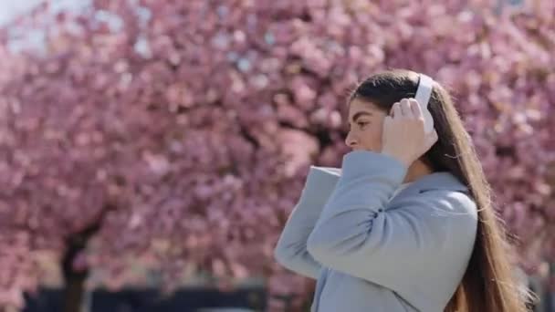 Carefree Young Woman Smartphone Hands Listening Music Headphones Enjoy Good — Stockvideo