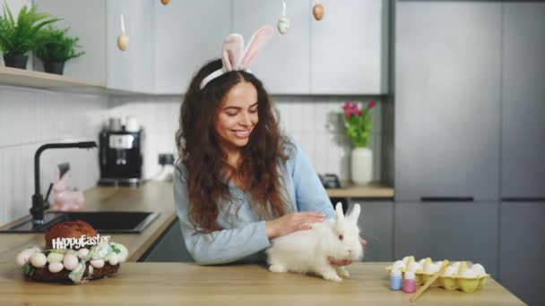Portrait Happy Woman Bunny Ears Playing Rabbit Decorated Kitchen Getting — Stock Video