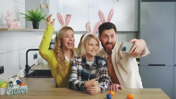 Family Smiling Together Taking Selfie Easter Eggs Wearing Bunny Ears — Stock video
