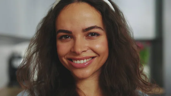 Portrait of the smiling multiethnic women standing on the decorated kitchen during easter holidays. Holiday atmosphere. Happy lady preparing for easter. Close up