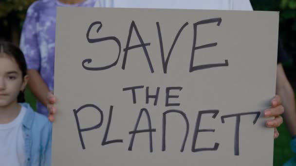 Close Hands Holding Planet Poster Public Demonstration Volunteers Protesting Earth — Stock Video
