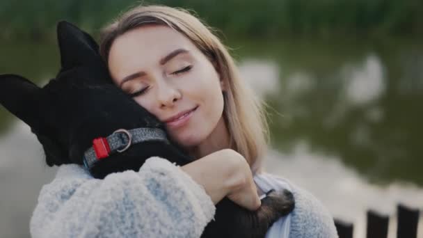 Happy Caucasian Woman Pet Owner Closed Eyes Hugging Kissing Her — Vídeo de stock