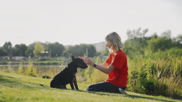 Happy Caucasian Girl Owner Park Playing Her Mini Bull Terrier — Vídeo de stock