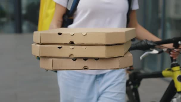 Woman Courier Carries Pizza Her Hands Client Going Business Centre — Video