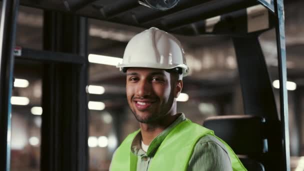 Portrait Smiling Multiracial Male Operator Wearing Special Uniform Sitting Forklift — Stock Video