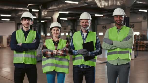 Smiling Team Diverse Machine Technicians Workers Safety Uniform Standing Arms — Stock Video