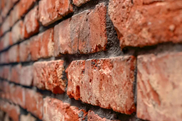 Old red brick wall inside the house