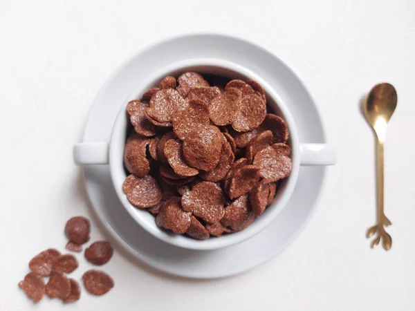 stock image Choco cereal in ceramic bowl. Isolated background in white. Bright mood photography. Minimalist concept.