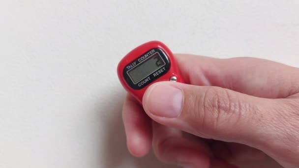 Hand Counting Using Digital Tally Counter — Stok video