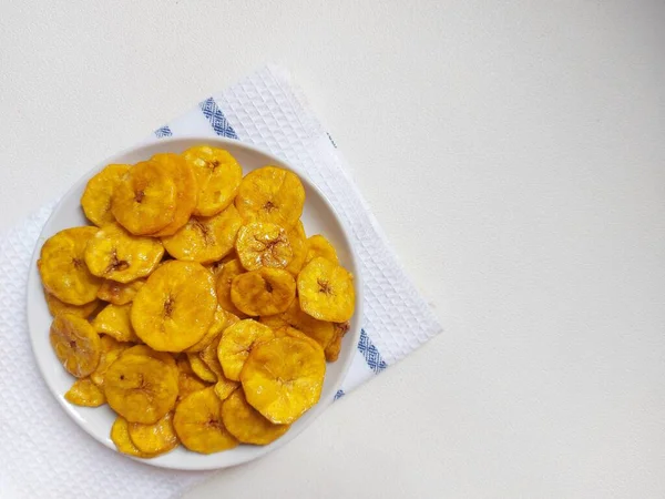 Sweet banana chips. It is traditional snack from indonesia. Made from banana and sugar. Sweet and crispy.