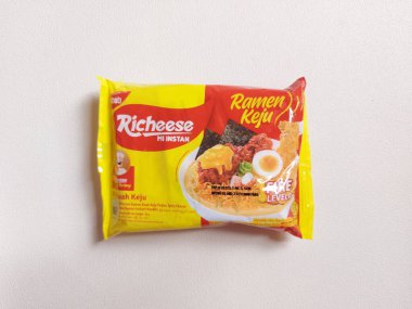 Bogor,indonesia-jan 27 2023: richeese factory brand. It is instant noodle with cheese flavor. Popular brand in indonesia. Isolated background in white