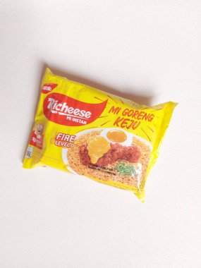 Bogor,indonesia-jan 27 2023: richeese factory brand. It is instant noodle with cheese flavor. Popular brand in indonesia. Isolated background in white