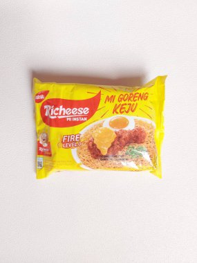 Bogor,indonesia-jan 27 2023: richeese factory brand. It is instant noodle with cheese flavor. Popular brand in indonesia. Isolated background in white