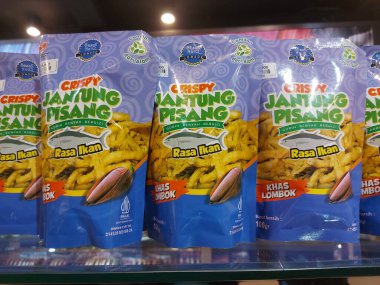 Lombok,indonesia-feb 8 2023: crispy jantung pisang. Made from banana blossom. It is traditional food from lombok. Authentic souvenir from lombok.