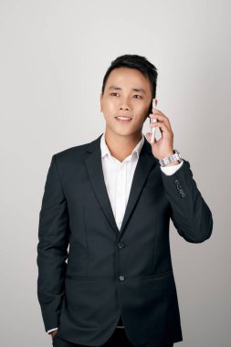 Businessman have conversation using mobile phone isolated on white background. 