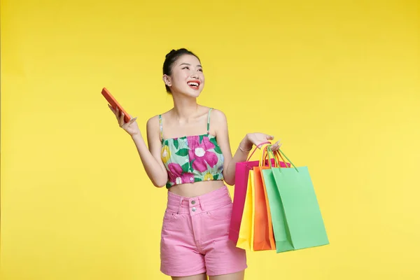 Attractive Asian Smiling Young Woman Carrying Shopping Colorful Bags Mobile — 图库照片
