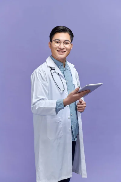 Young Doctor Male Holding Tablet — Stock Photo, Image